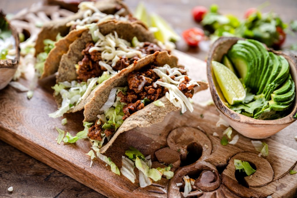 walnut soft tacos lined up on plate