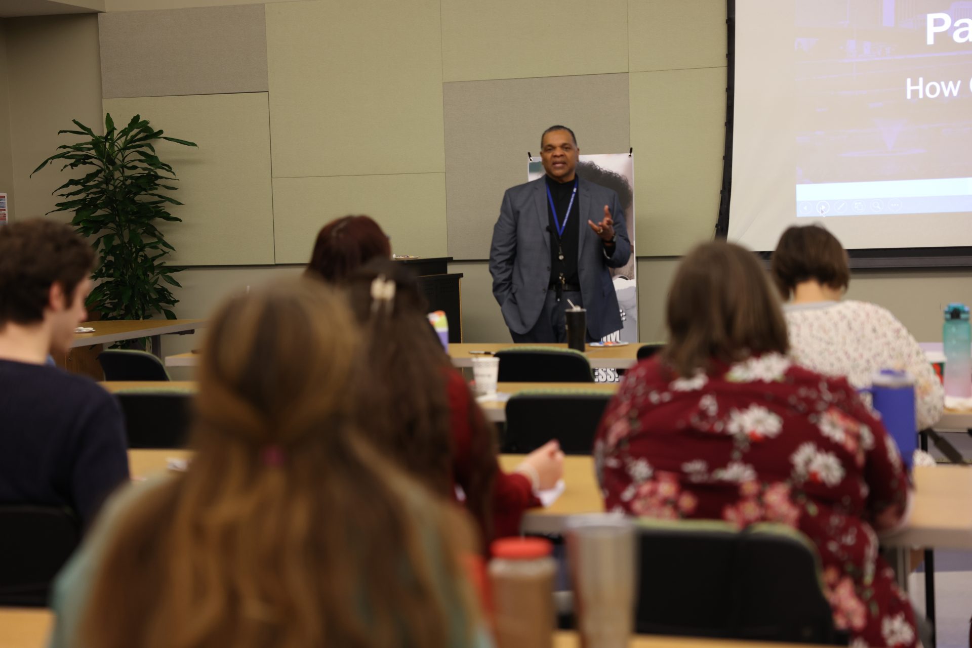 Group of people listening to a presentation